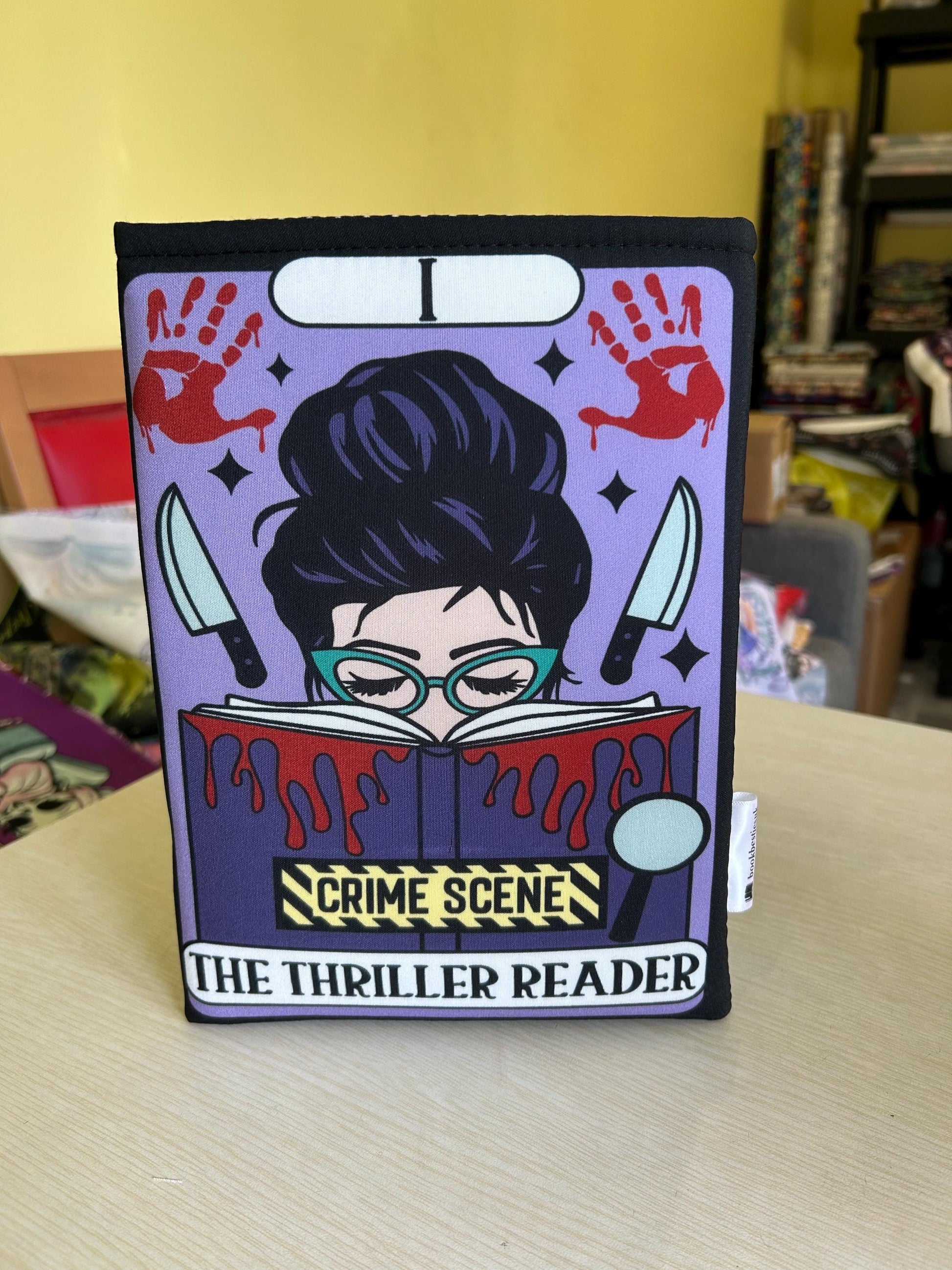 The thriller crime reader tarot style bookbestie book sleeve padded and lined book protector book jackets, fabric dust jackets
